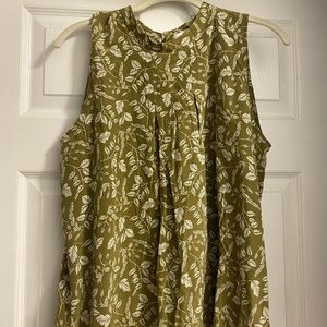 Sleeveless silk boutique blouse
